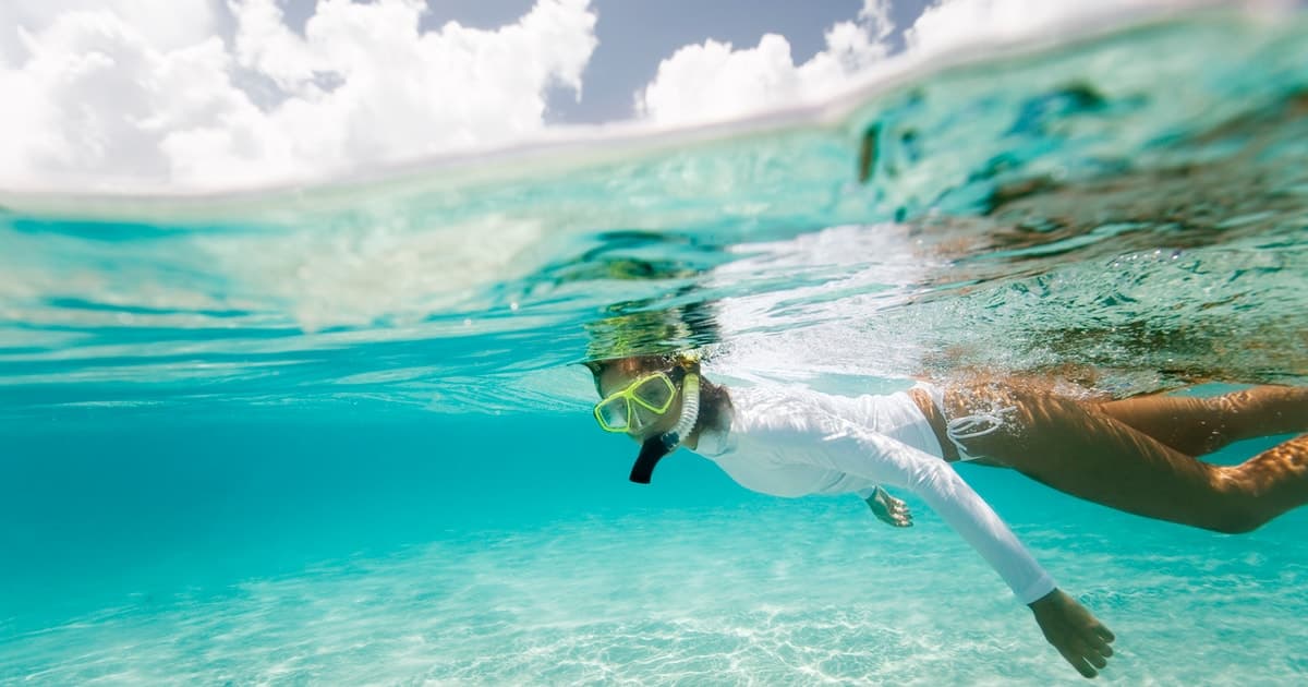 Desde Cancún: tour de un día en barco por la playa y esnórquel en Isla Mujeres