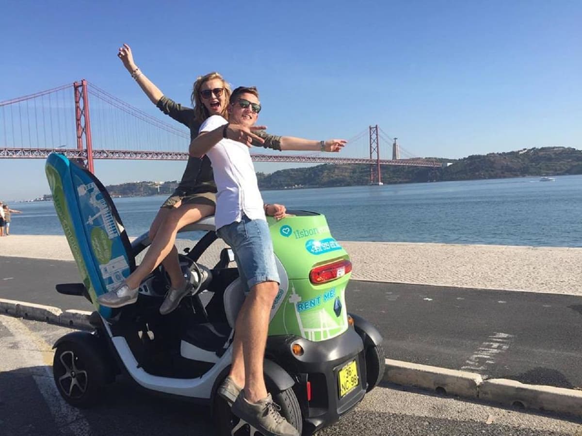 Lisbon 6H Ride in an Electric Car & GPS Audio Guide