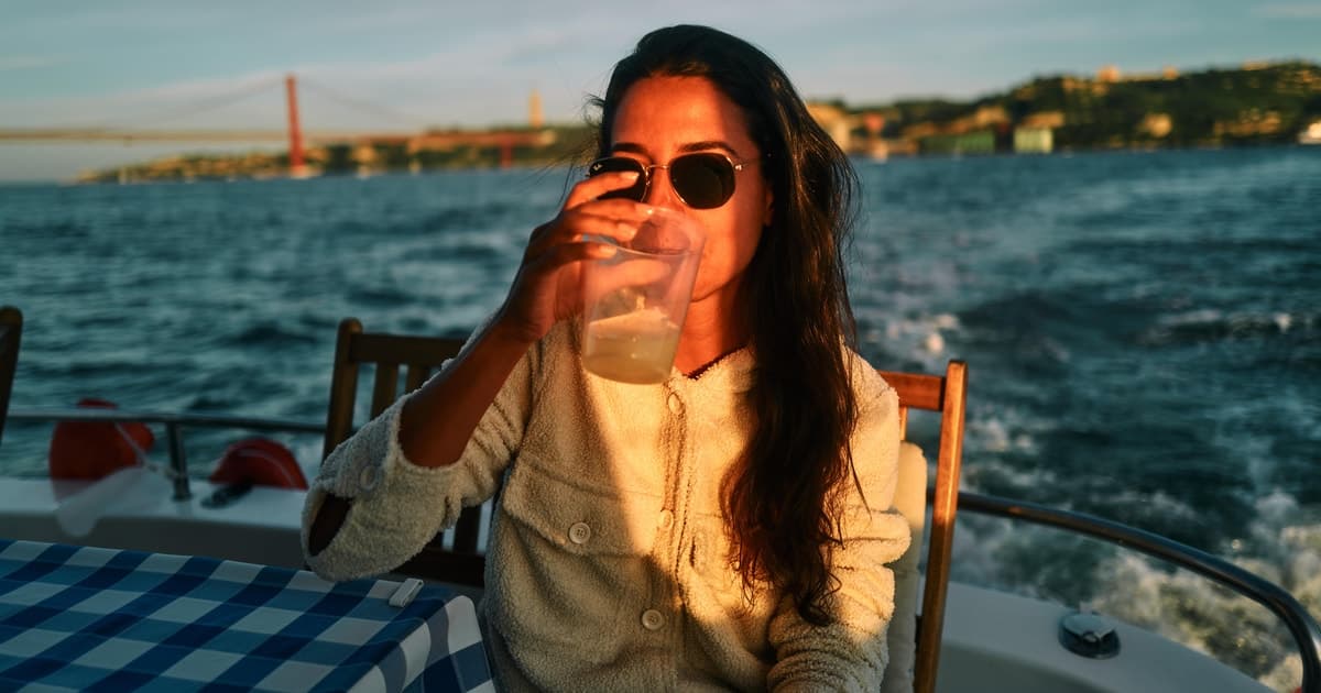 Lisbon: Mojito Sailing Sunset on a Catamaran