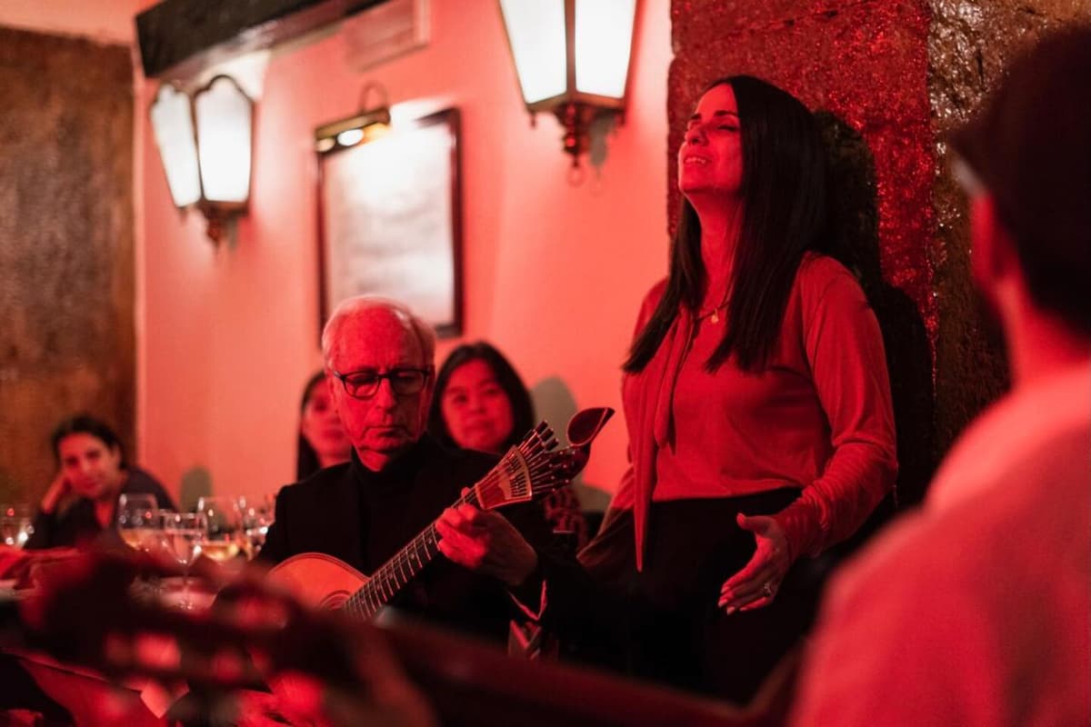 Lisbon: Fado Show and Pool Night with Travelers
