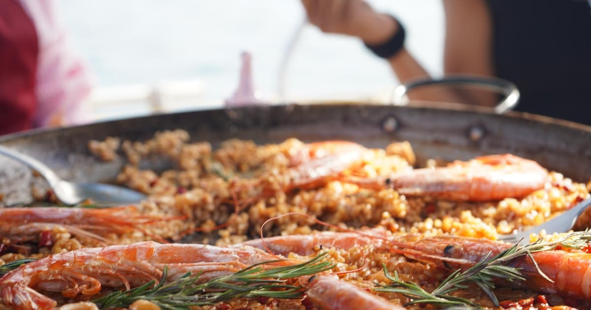 Barcelona: Sailing Trip with Paella, Drinks, and Swim Stop