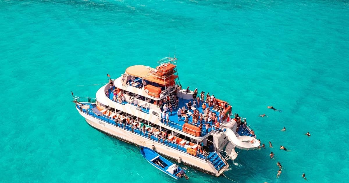 Cancún: crucero de un día completo a Isla Mujeres con baile