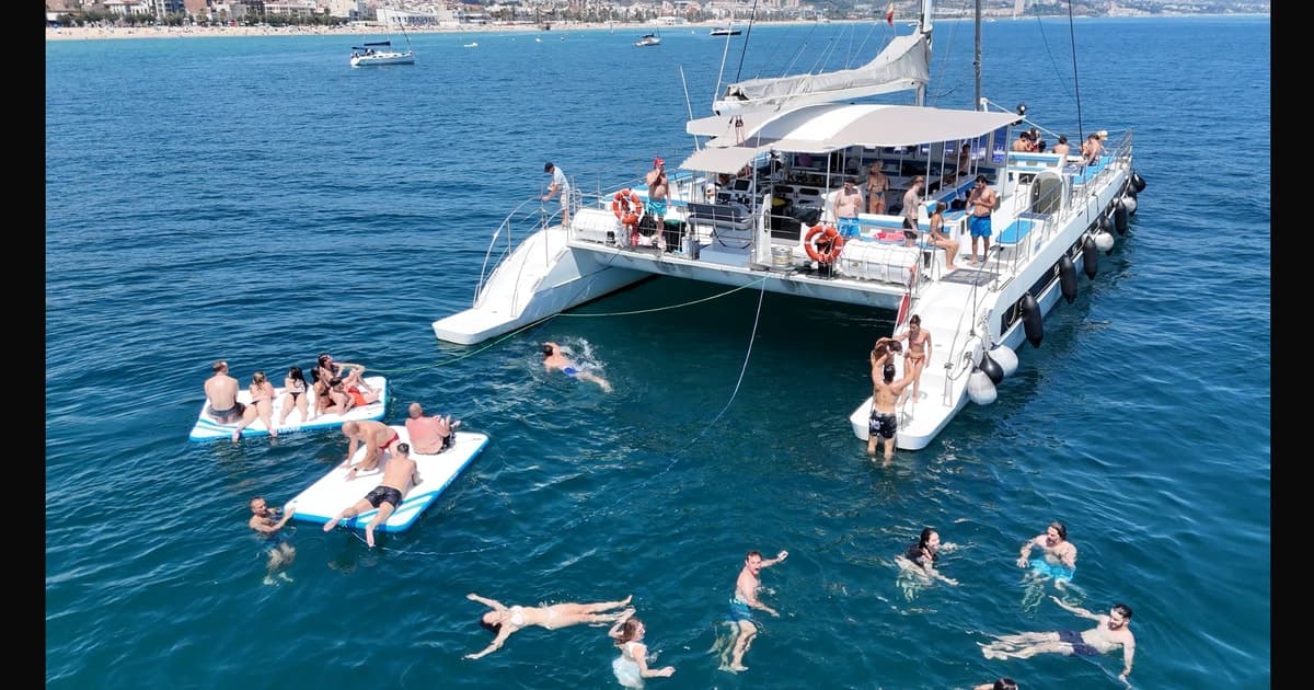 Barcelona: Catamaran Party Cruise with TAPAS Meal